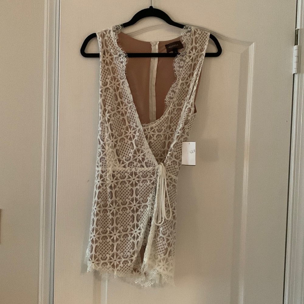 NWT white/nude lace romper.